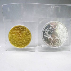 天皇陛下御在位六十年 拾万円 金貨 壱万円硬貨 2枚